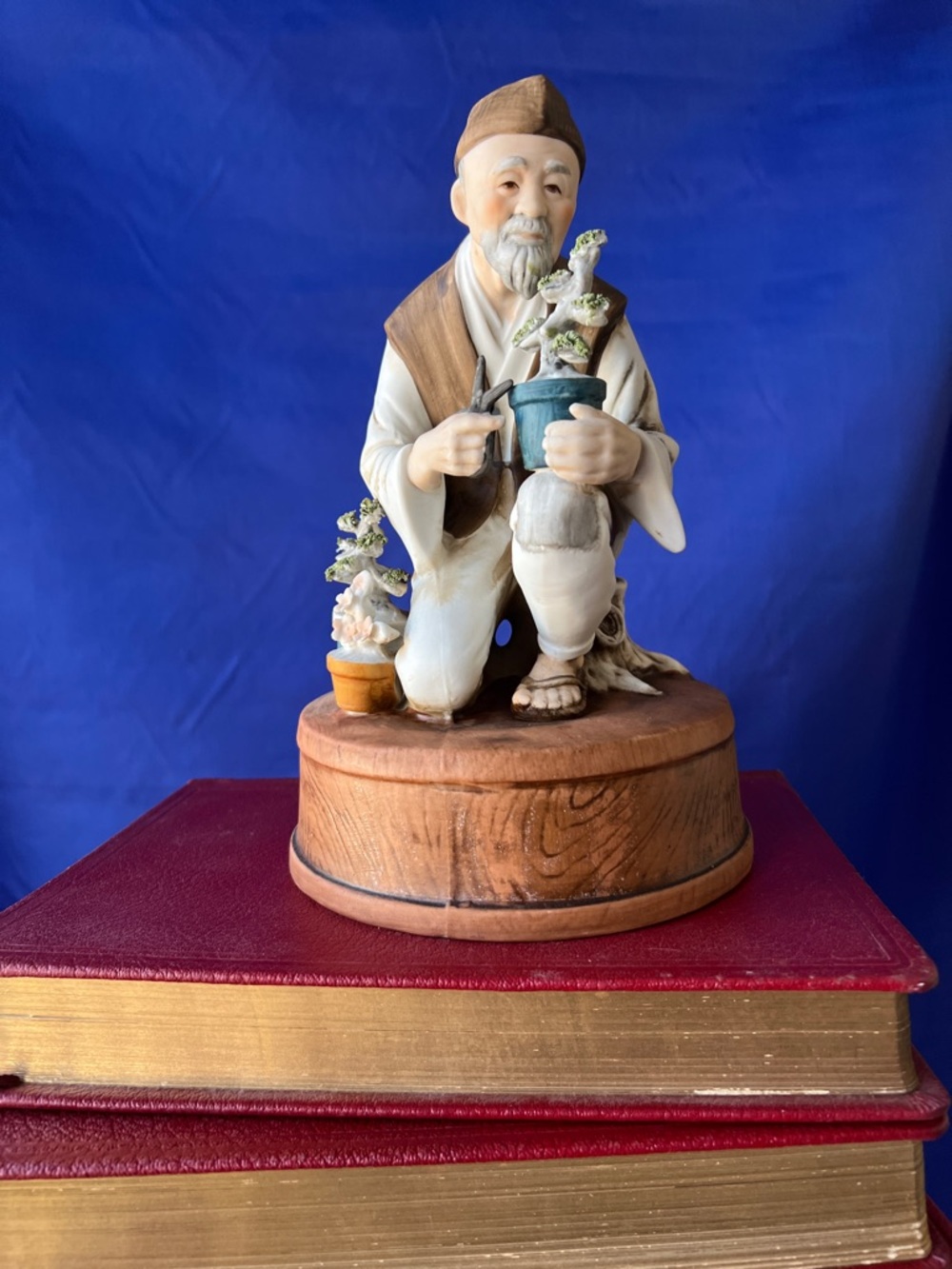 Porcelain Bonsai Gardener Figurine with Wooden Base